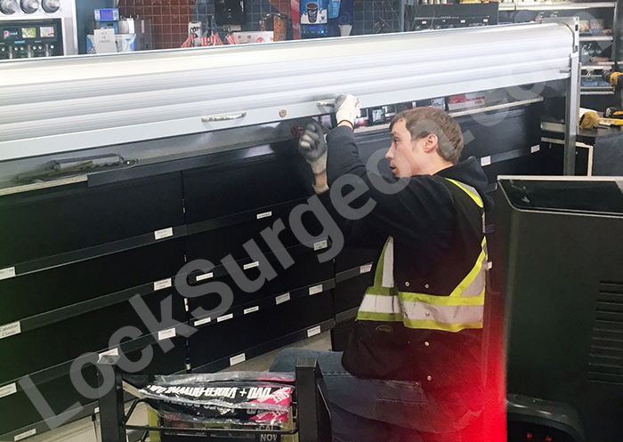 Roll shutter security installed by Lock Surgeon Edmonton South technicians protect store inventory.